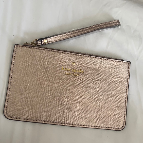 kate spade Handbags - Kate Spade rose gold wristlet